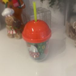 Brand new squish, mellow Christmas cup with straw would make a great gift or stocking stuffer never been used tag still on it