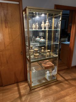 GLASS ANTIQUE  CABINET- made in USA 