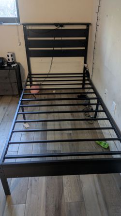 Twin platform bed with lights and outlets