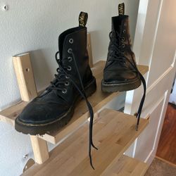 Size 11 Women docs 9.5 men 