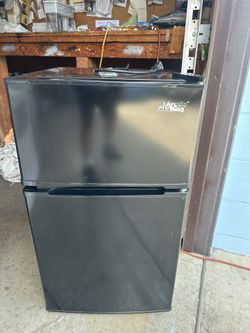 Mini Refrigerador Arctic King.