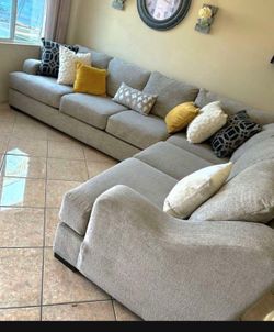 Beautiful Beige sectional couch from Jerome’s