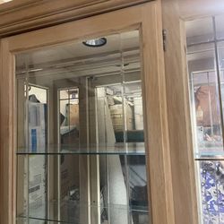 Free 1 glass display cabinet. 1 round marble wooden table. Free !!