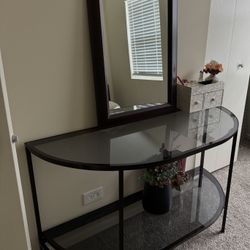 half moon glass table and wooden mirror 