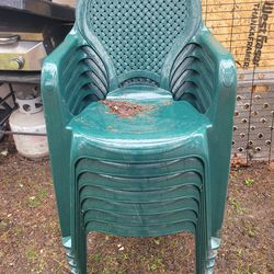 Outdoor plastic tables and lawn chairs