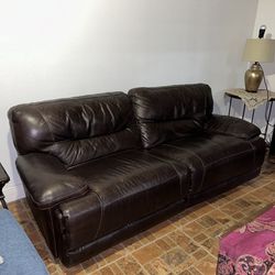 BROWN LEATHER RECLINING COUCH
