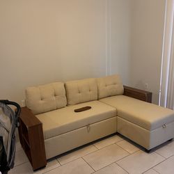 Upholstered sofabed with chaise and storage