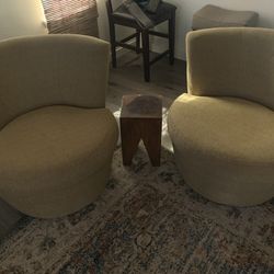 Two Swivel Chairs