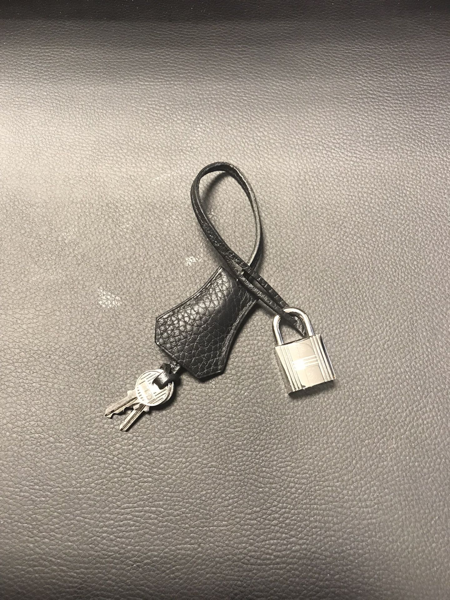 Authentic Hermès lock and key