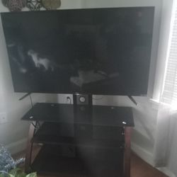 TLC 55"inch W/ Roku & TV stand