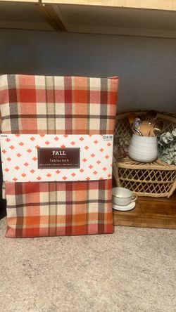 Brand new tablecloth  I have 2 each $15
