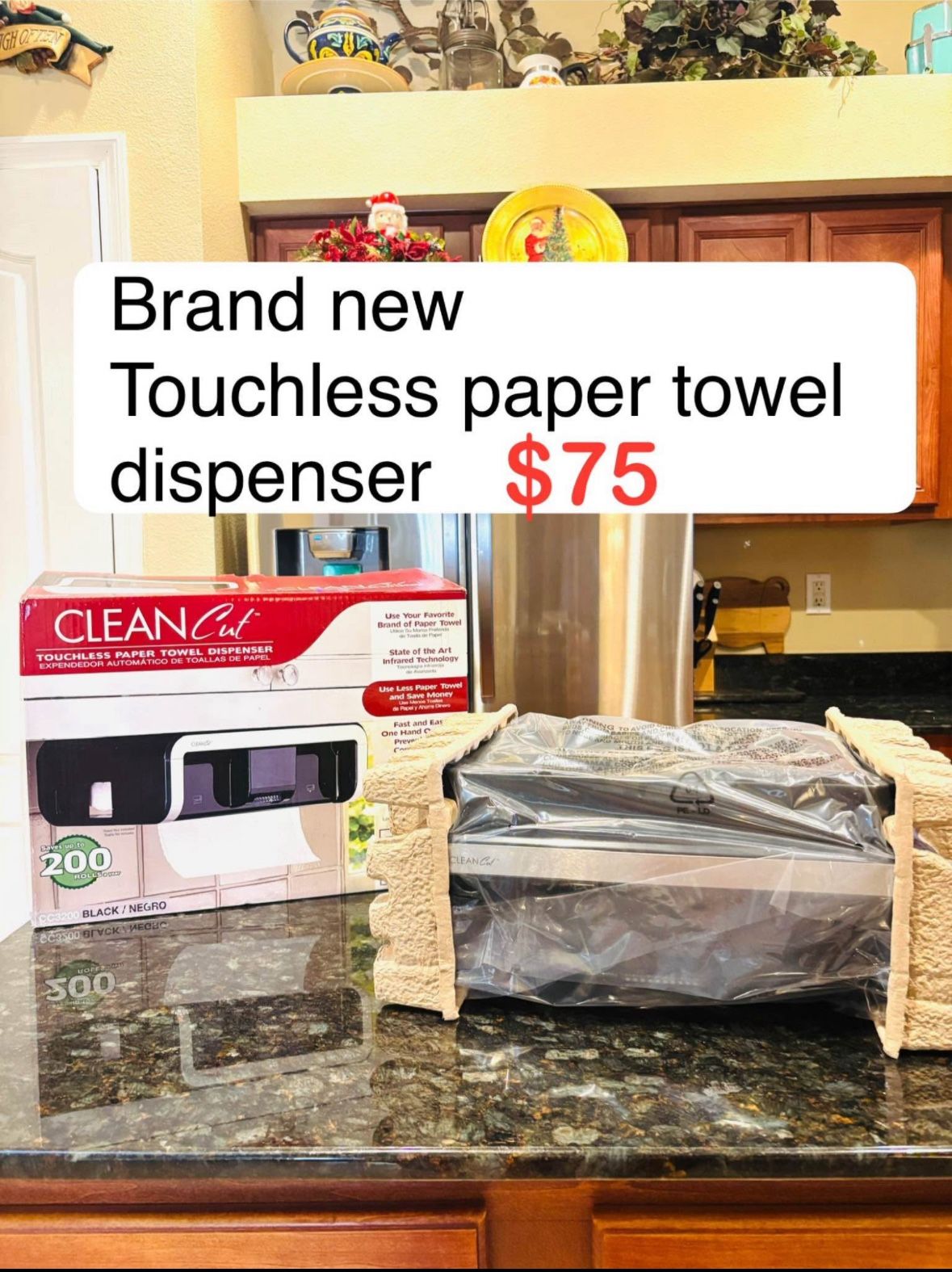 Brand new CLEANCut Touchless Paper towel dispenser