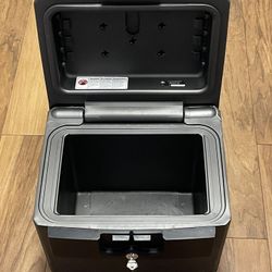 SentrySafe 0.65-cu ft Fireproof , Waterproof Safe box with Keyed Lock