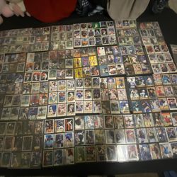 35 3x3 Sheets Of Baseball And Football Cards 