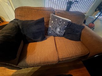 Brown loveseat couch