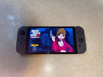NINTENDO SWITCH OLED + 7500 GAMES INSTALLED