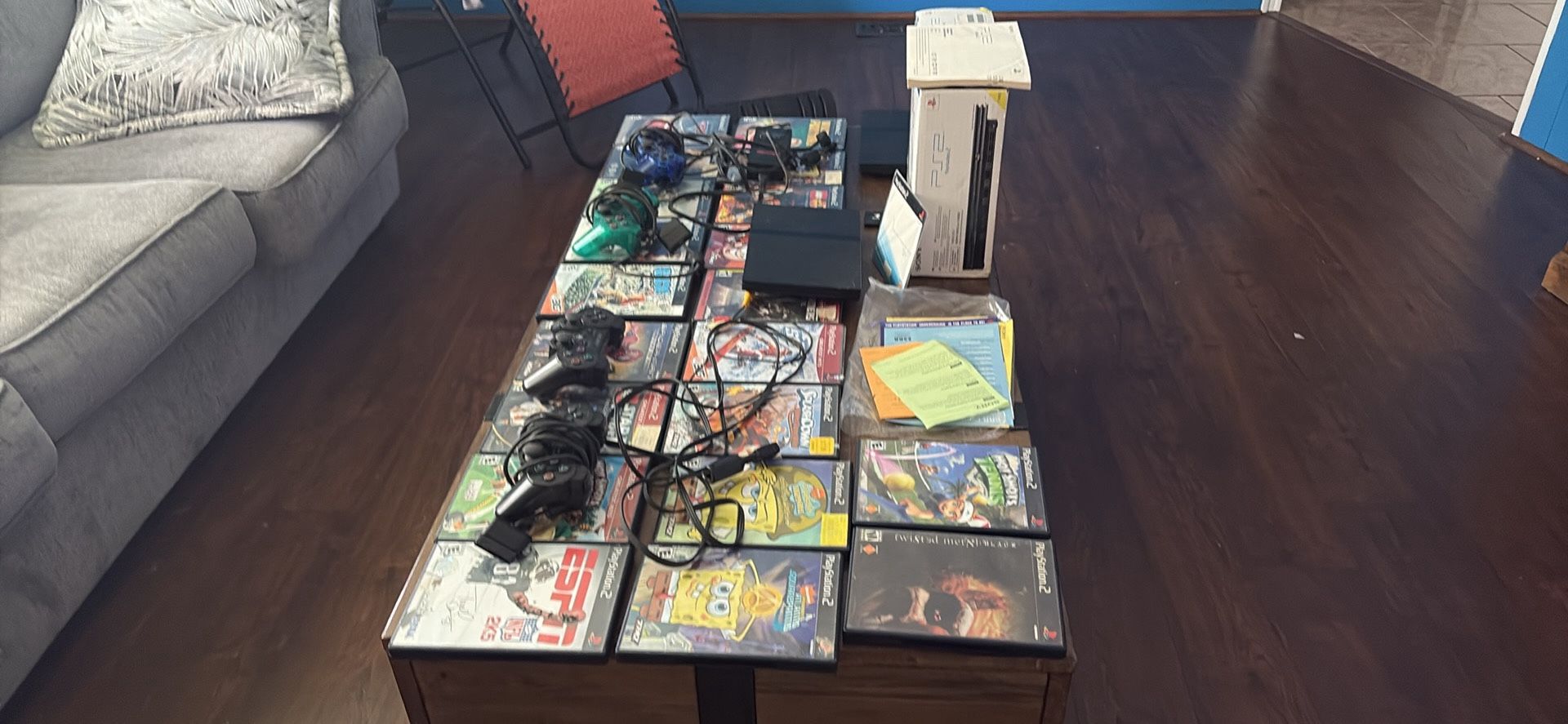 Ps2 two both tested original box multiple games and 4 controls and Memory card plus 1 set of wires Tested works can see working as well willing to mee