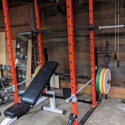 Weight Cage With Bench, Bar, Pulley, And Weights 