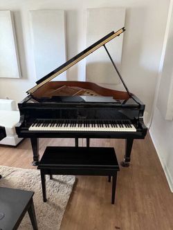Boston GP-178 grand piano, finished in elegant polished ebony and in excellent condition for free