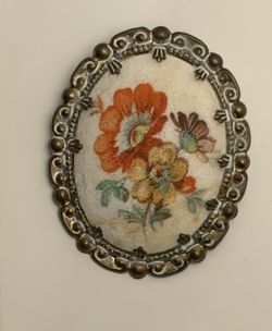 vintage floral sugar cameo brooch, typically originating from Western Germany during the 1950s. 