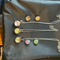 (E) Three Stainless Steel Necklaces With Seven Charms