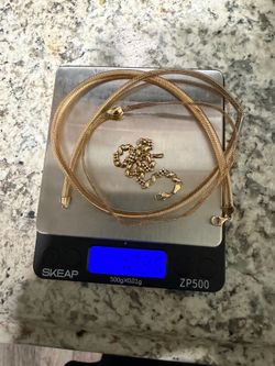 18k gold bracelets and cord
