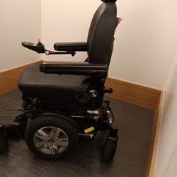 Optimum  J-4.   Electric Wheelchair