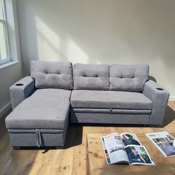 Small Grey Sectional W/Pullout Bed And Storage 