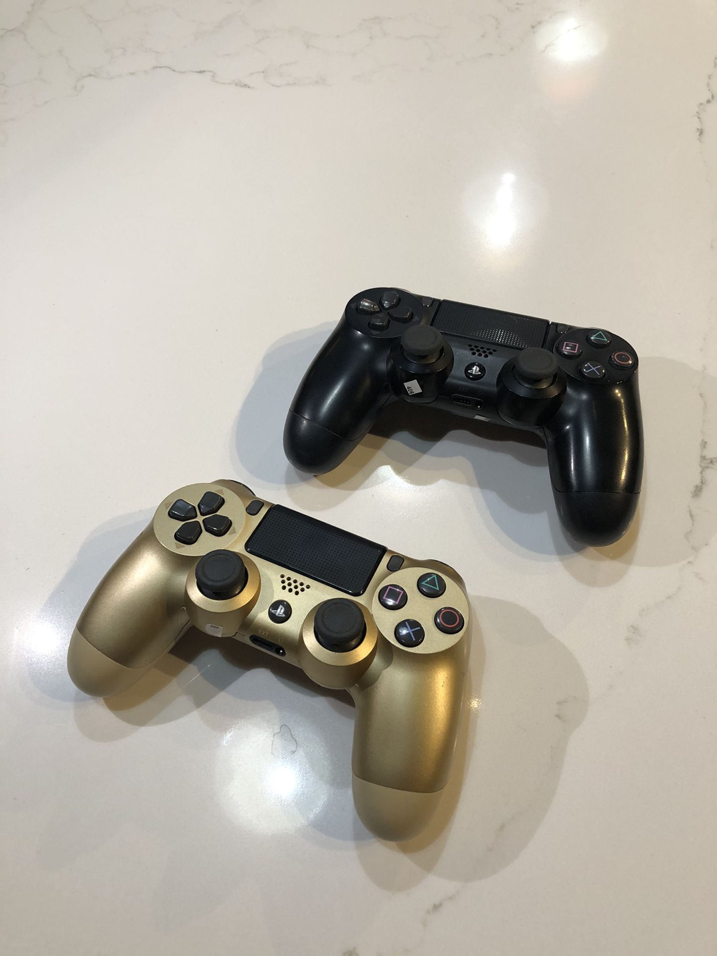 PS4 controllers pre-owned from GameStop. Just out of box