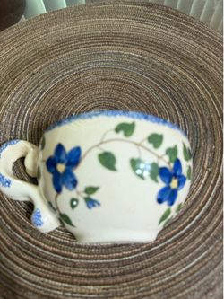 Antique wall pocket with flower design / blue & white