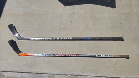 Two Used Hockey Sticks CCM Vector and Demolition C4