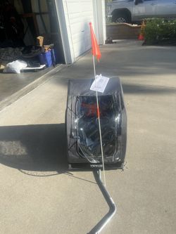 VEVOR dog / pet bike trailer — flag + hitch