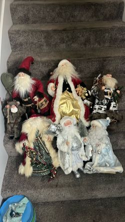 Collection of Decorative Santa Claus Figurines