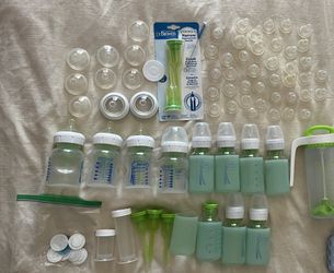 7 Dr. Brown’s Glass Baby Bottles + Silicone Covers + 4 Plastic Wide-Neck