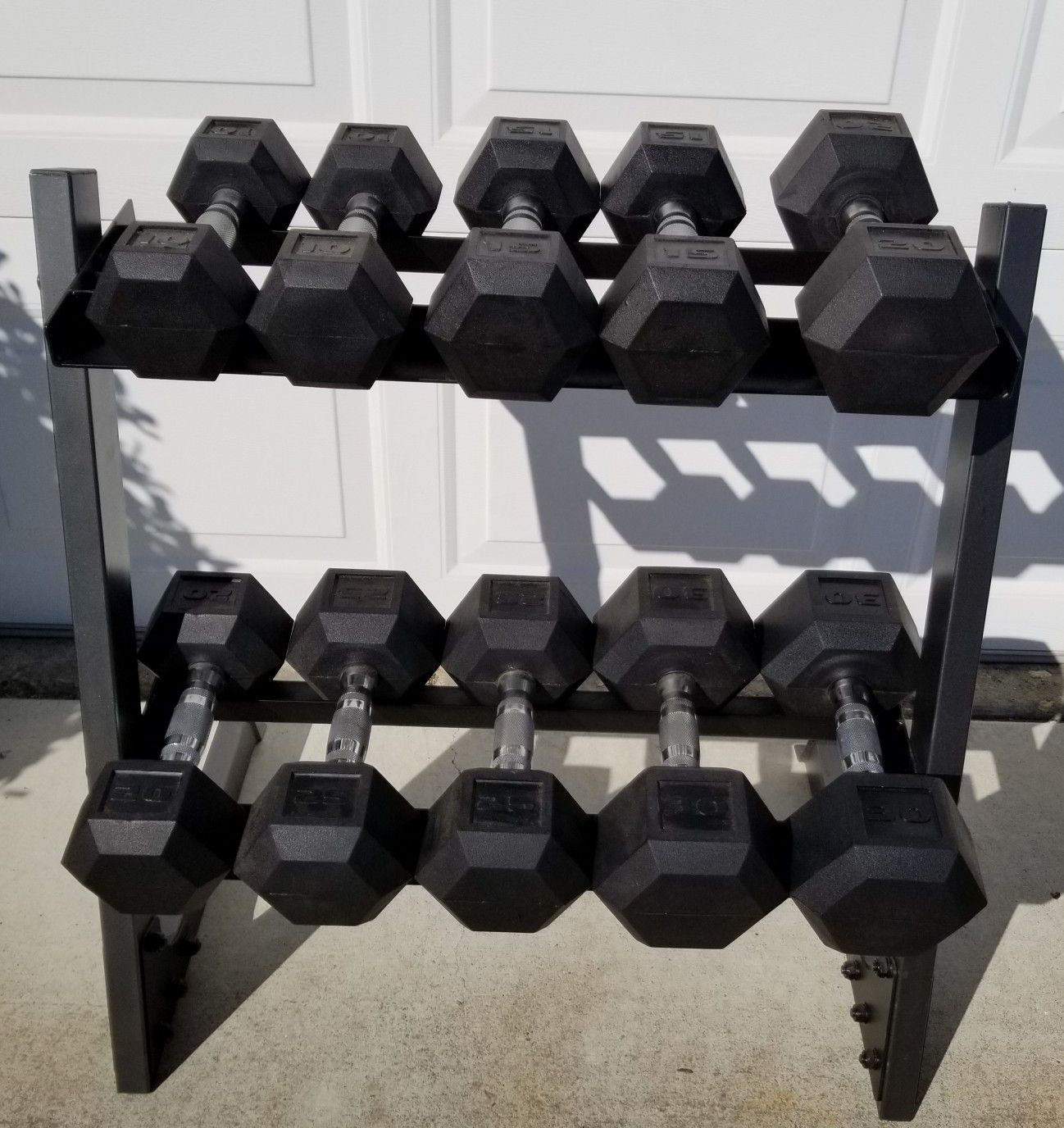 CAP rubber hex dumbbells 10 to 30 pounds with rack