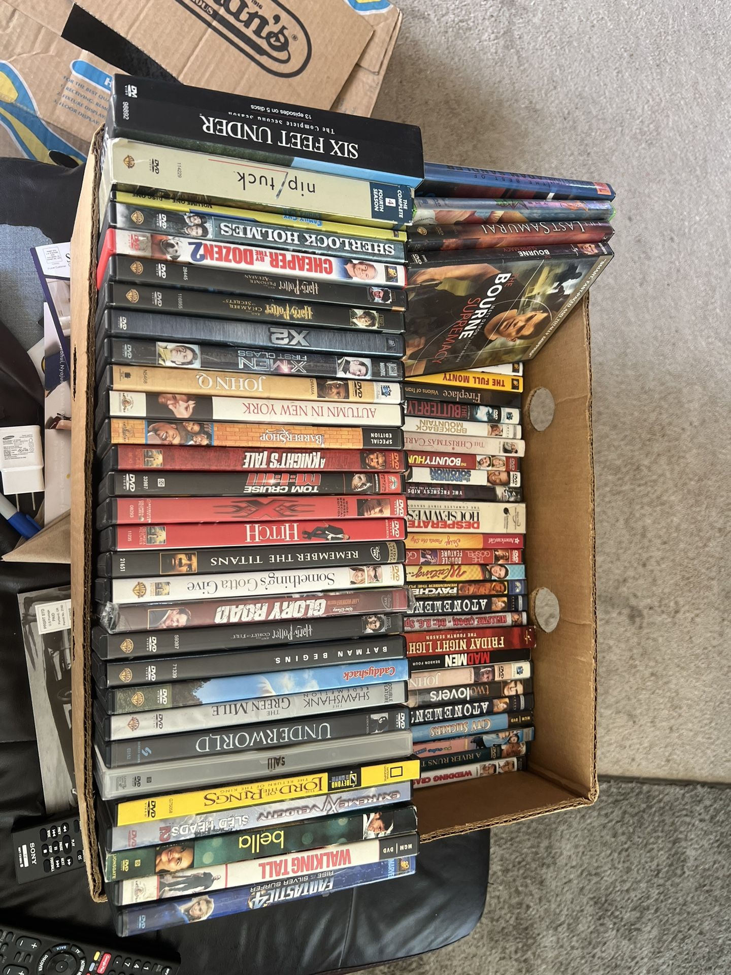 100+ DVDs In Cases Or 160 DVDs In A Binder