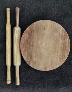 Moving out sale. Set of 1 rolling board (wooden) & 2 rolling pins (wooden)