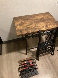 Table and chairs chairs still need to be assembled