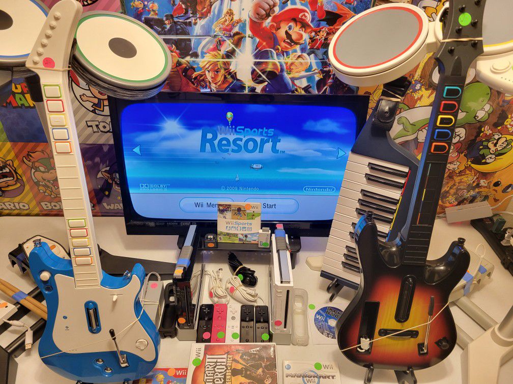 Huge Nintendo Wii Rockband Guitar Hero Drums Super Mario Kart Resort Video Games