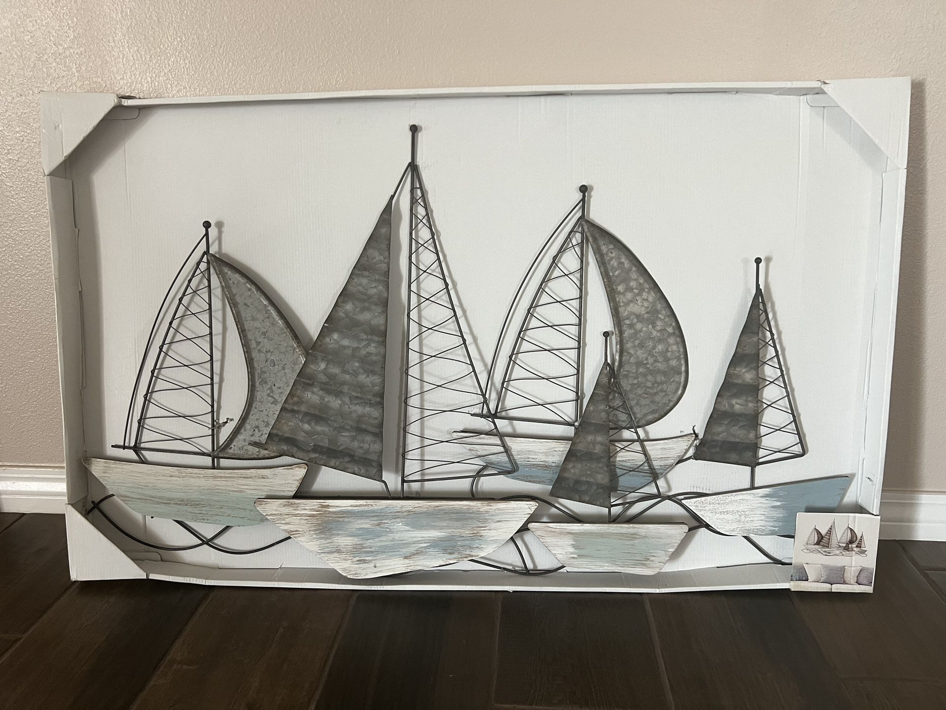 New in box sailing sailboats wall decor . Mental & wood. Measuring approximately 38.5 long & 23 inches tall. $30 firm located in menifee 
