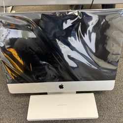 Apple Monitor with keyboard and mouse