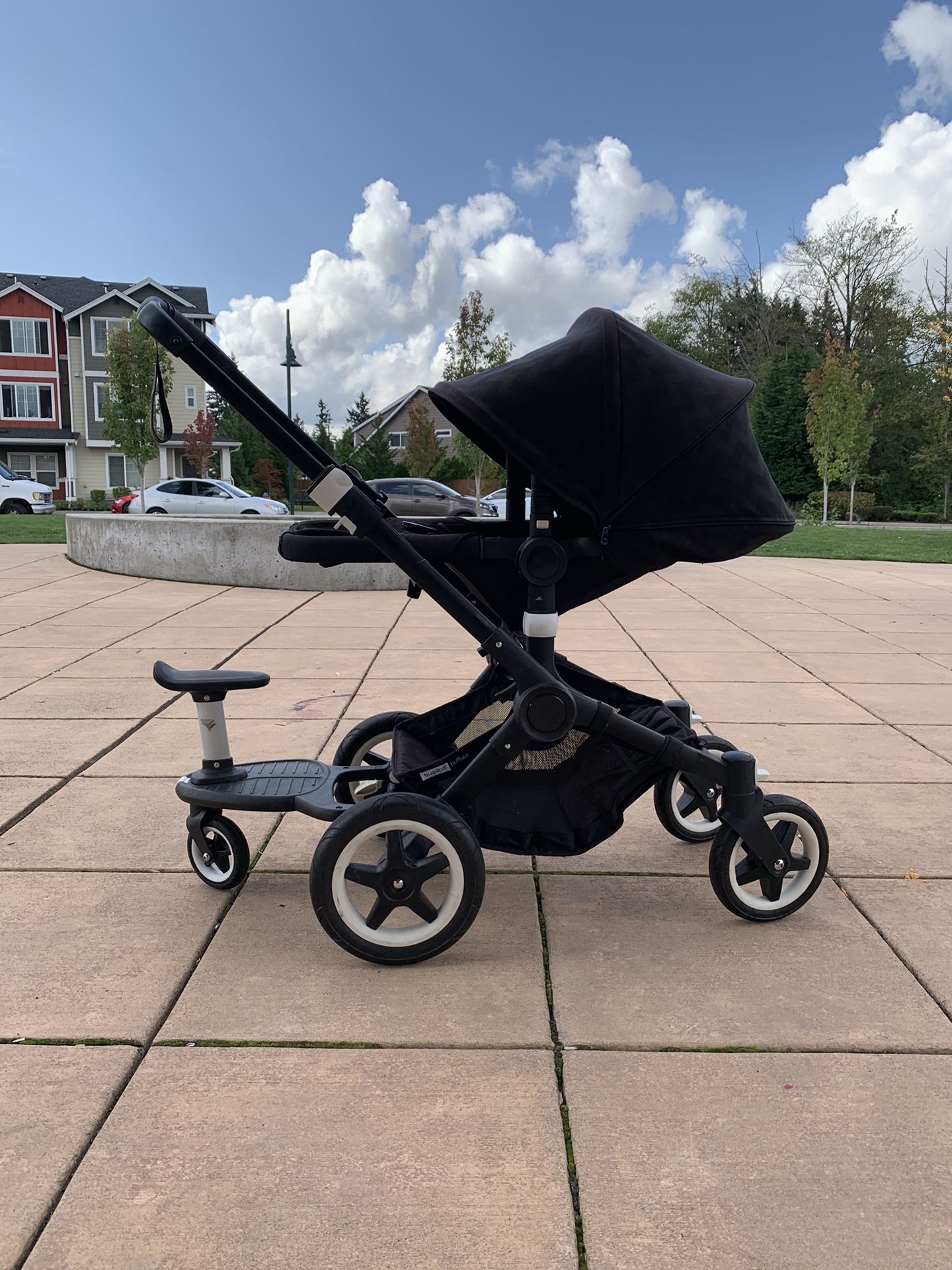 Buffalo bugaboo stroller with bassinet, car seat and second child attachment!