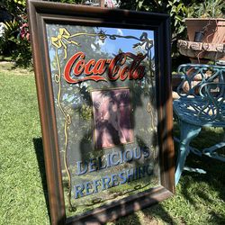 Coca-Cola framed sign
