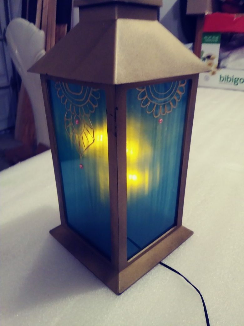 Lanterns with gold design and rhinestone