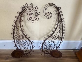 Pair of metal paisley wall sconces
