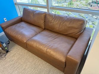 Beautiful cognac/tan brown leather sofa in great overall condition.
