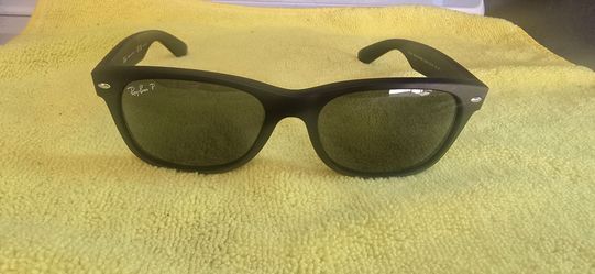 Men  Rayband glasses.