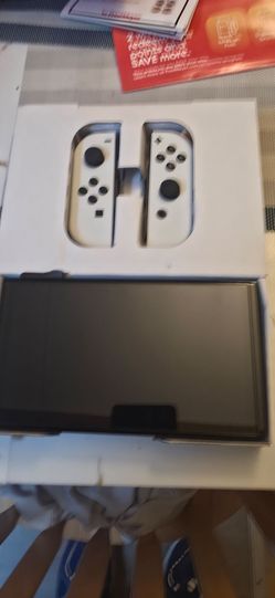 OLED NINTENDO SWITCH +128GB MICRO SD CARD AND CARRY CASE AND BOX