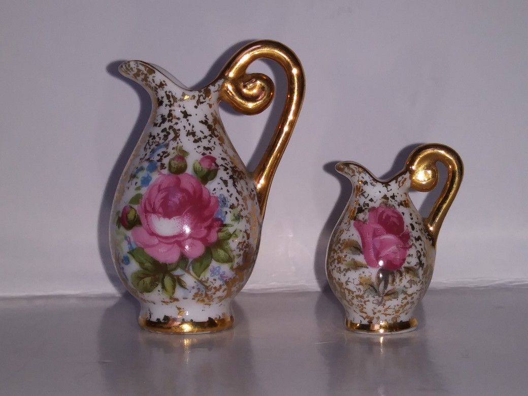 Set Of 2 Miniature Pitchers featuring a rose and gold accents