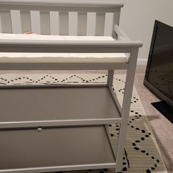 Delta children flat top changing table with wheels